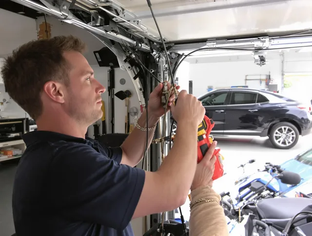 French Valley Garage Door Repair safety certified technician performing cable replacement in French Valley